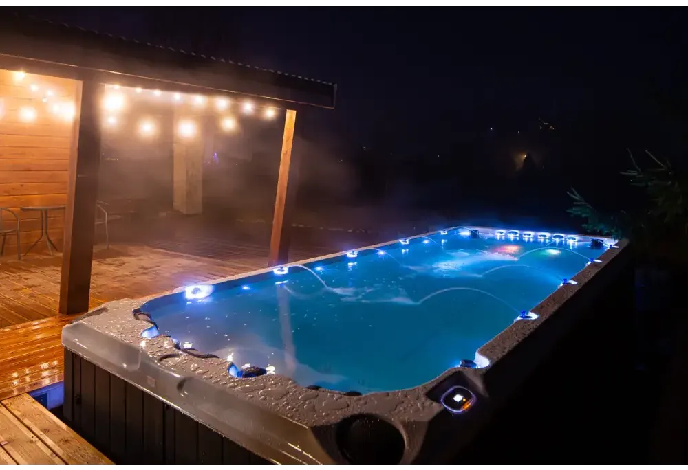 Blåljusen PassionSpa Activity 2 Deep Swim Spa med grå textur och kantbelysning